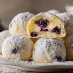 lemon blueberry cheesecake snowball cookies - featured image