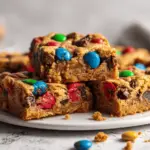 loaded monster cookie bars - featured image