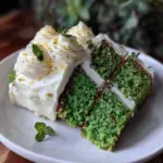 emerald green defying gravity layer cake - featured image