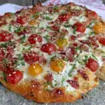 crispy grilled pizza on stone - featured image
