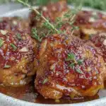 crispy slow cooker honey garlic chicken thighs - featured image